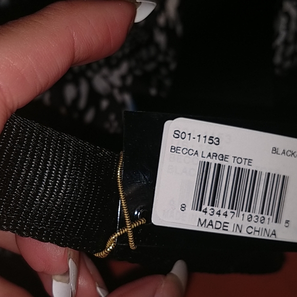 BEBE Sport Becca Large Duffel
Black/White Snake Pr - Picture 8 of 8